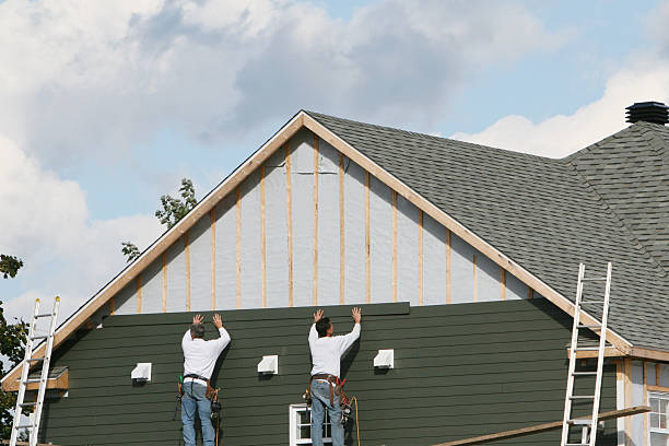 Professional Siding technician working in Covington, VA